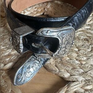Justin Western Silver cowhide / ostrich pattern belt. In very good vintage cond